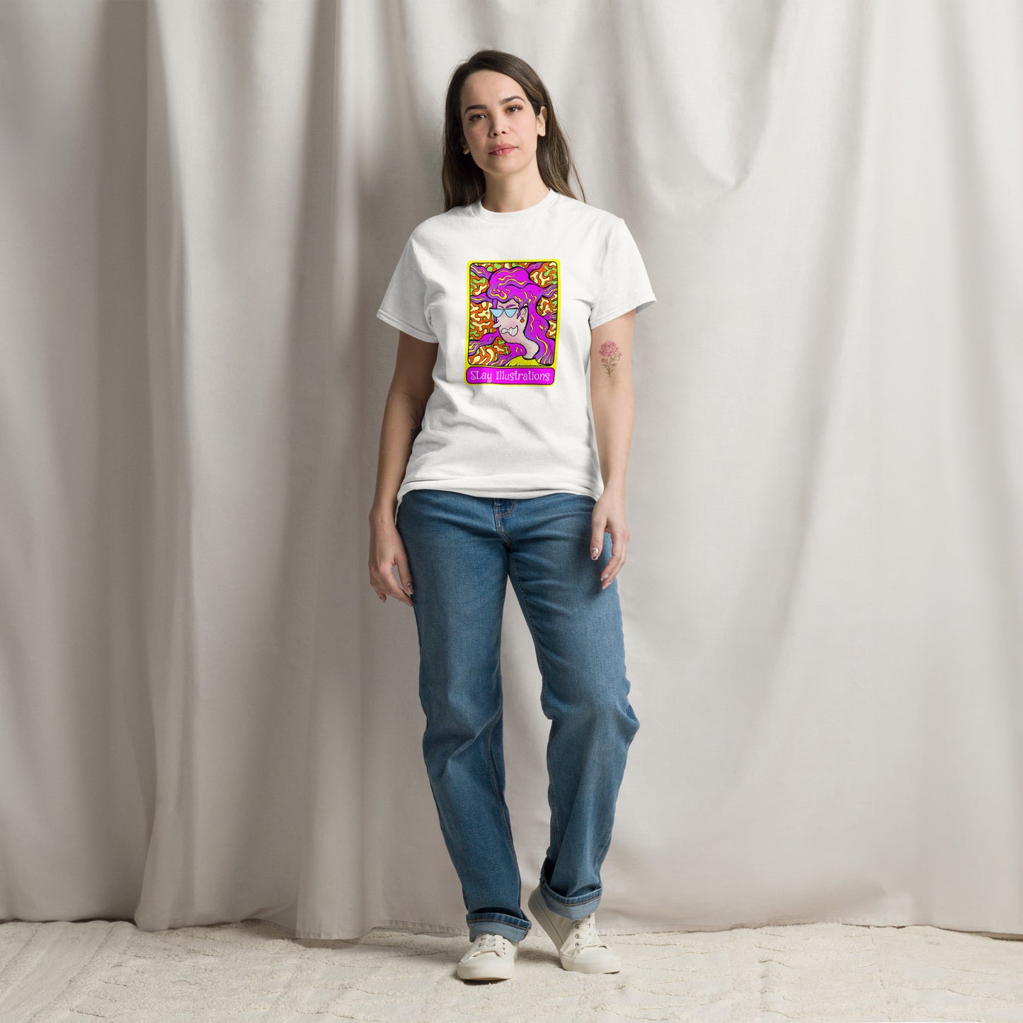 Woman wearing Groovy cotton tee with 1960s psychedelic vibes, bold colours & punk flair streetwear style